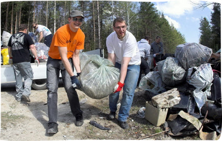 men cleaning up rubbish